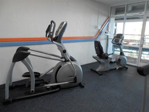 Elliptical machine in fitness room