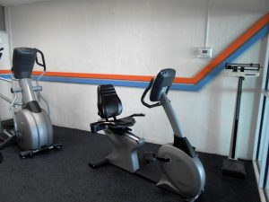 Elliptical machine side view in gym
